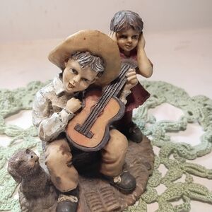 Unique Vintage Style Boy with Guitar, Dog, And Girl Covering Her Ears